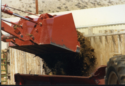 Ranchers practice manure management on their Pinedale, Wyo. cattle operation. Here Albert Sommers loads the manure spreader.