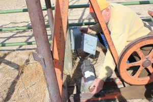 Bob Harshbarger makes repairs to one of the pumps