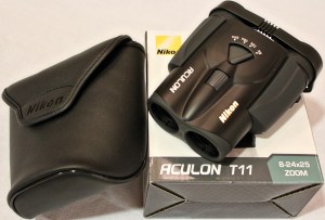 Nikon binoculars with 8-24x25 zoom. Black. Comes with protective case. Donated by Dennis Sun.